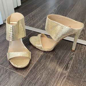 Women’s gold heels.